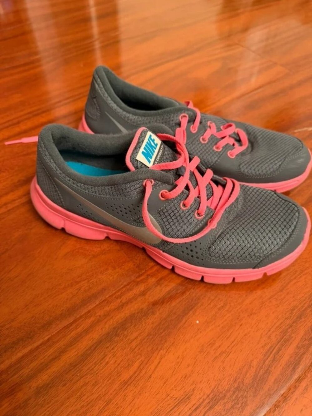 Pink and gray women’s Nikes